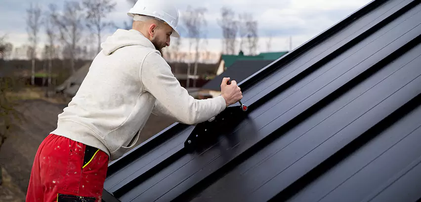 Tin Roof Ridge Cap Installation in Elgin